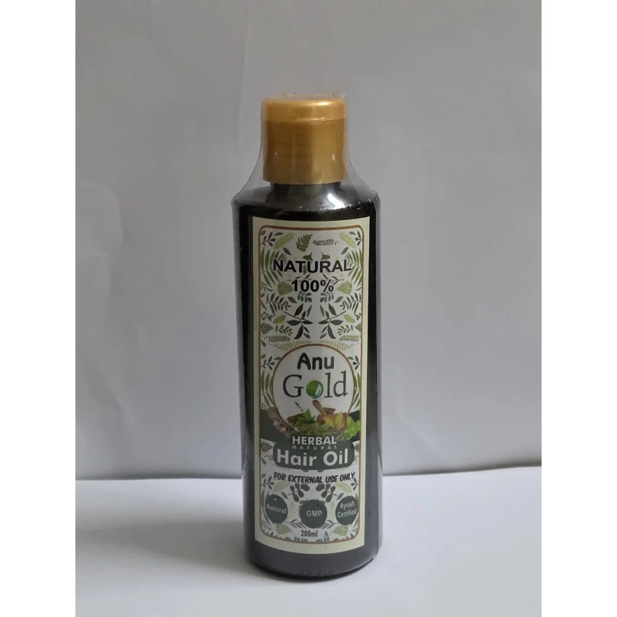 Raw customer photo before editing: Anu Gold Herbal Natural Hair Oil, Reduces Hair Fall, Natural Shine, Ayurvedic, 200 ml